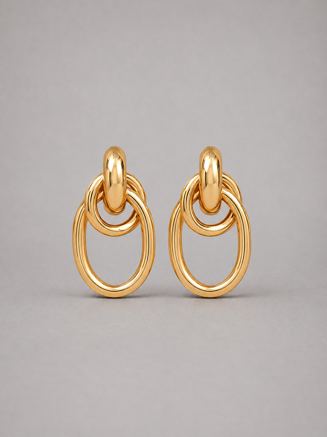 MAISON – BOUCLES D’OREILLES À ANNEAUX ENTRELACÉS