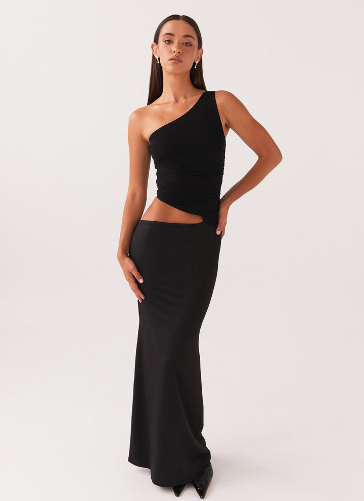 CHLOÉ NOIRE – ROBE LONGUE ASYMÉTRIQUE