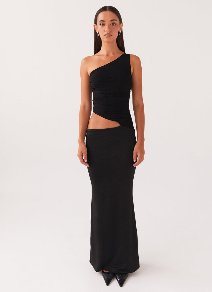 CHLOÉ NOIRE – ROBE LONGUE ASYMÉTRIQUE